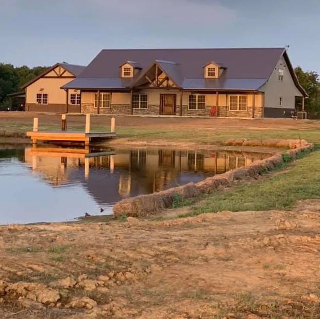 Custom barndominium home in Northwest Florida with metal and wood exterior